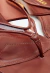 Rasteira vinil marrom Cecconello, tiras transparentes, couro legítimo e detalhe dourado. Conforto e elegância para looks de verão. Garanta a sua!
