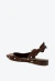 Sapatilha slingback em cetim poá marrom Cecconello, bico fino, laço lateral e salto baixo. Ideal para looks elegantes e confortáveis. Garanta já a sua!