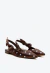 Sapatilha slingback em cetim poá marrom Cecconello, bico fino, laço lateral e salto baixo. Ideal para looks elegantes e confortáveis. Garanta já a sua!
