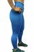 Persona usando calza turquesa ajustada de talle alto 