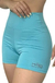 Short celeste de mujer, ajustado y deportivo, con logo de MIRO Sports en la parte inferior izquierda