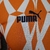 Camisa Costa do Marfim Pré-Jogo 23/24 - Jogador Puma Masculina - Laranja com detalhes em branco e verde - Camisa de Força