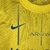 Kit Infantil Al-Nassr I Nike 23/24 - Amarelo com detalhes em azul - Camisa de Força