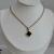 Collar Trébol Cristal Negro S | Acero Dorado - comprar online
