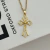 Collar Cruz con Cubic | Acero Dorado