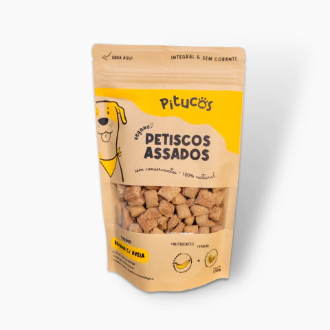 Petisco Treino Natural de Banana com Aveia 140g em sua embalagem de cor marrom com detalhes em amarelo.