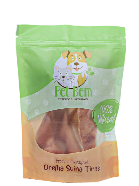 Produto Orelha Suina em Tiras de 60g em sua embalagem transparente com detalhes em laranja e verde.