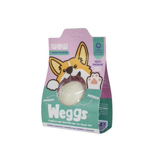 Embalagem de Petisco WOW Weggs Sabor Lombinho com Cúrcuma 1un, caixa de cor verde escuro e rosa claro, bolinha comestível para cães no centro da embalagem.