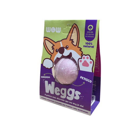 Embalagem de Petisco WOW Weggs Sabor Lombinho 1un, caixa de cor roxo escuro e verde claro, bolinha comestível sabor lombo no centro da embalagem.
