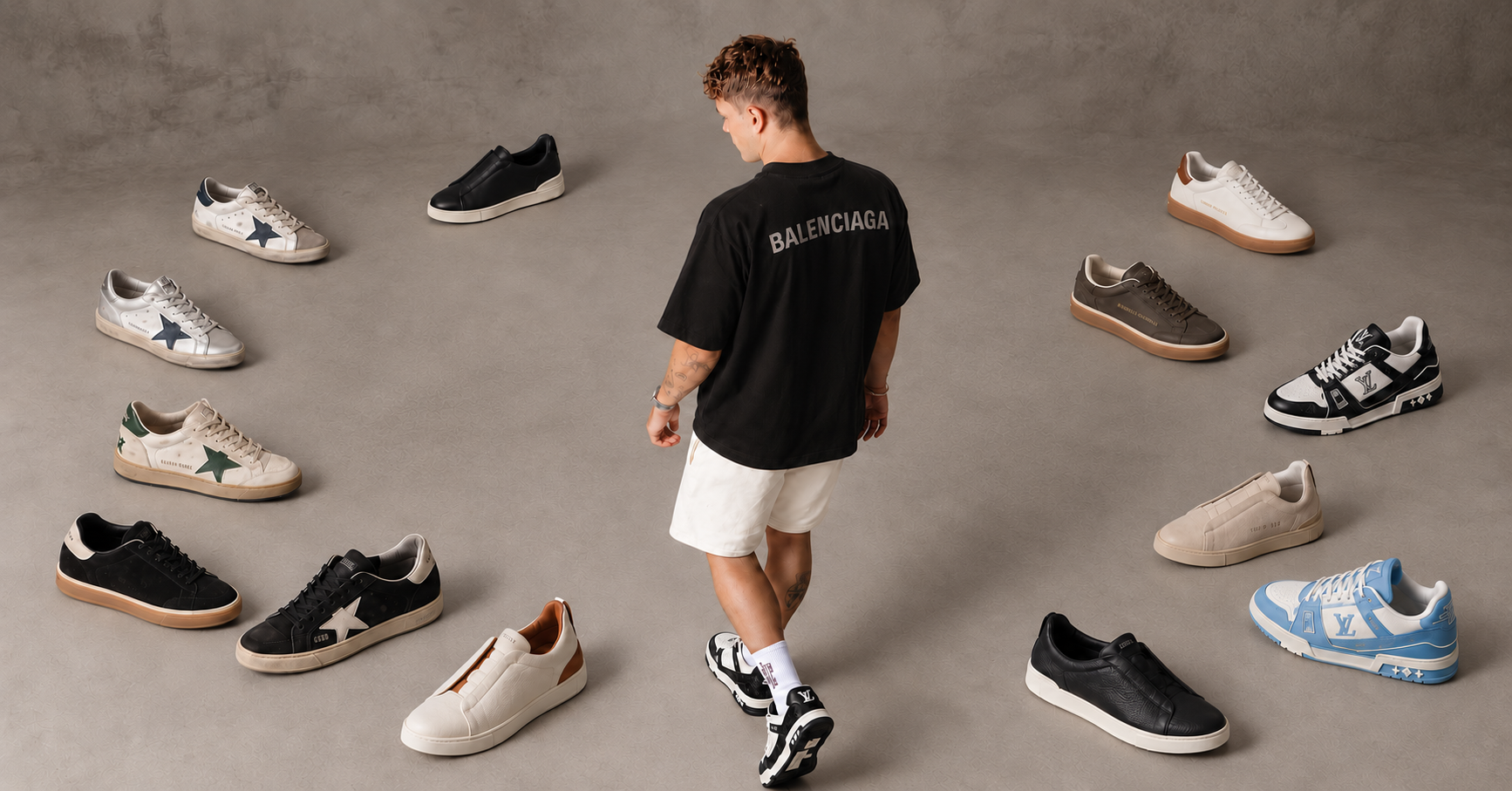 Modelo con outfit negro y selección de tenis de Eclipse Shop