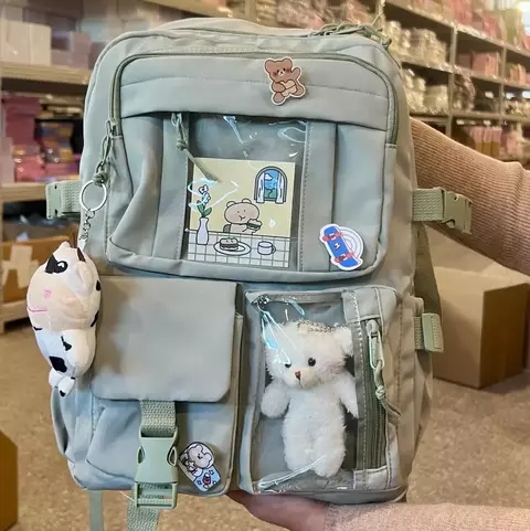 Mochila con peluche + pines decorativos - comprar online