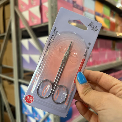 Tijera metálica de precisión para cejas