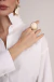 Anel redondo com pedra creme e aro dourado (regulável) - comprar online