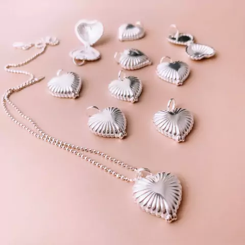 Pingente Relicário em prata 925