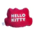 Almofada em formato do rosto da Hello Kitty com laço vermelho, ideal para decoração de quartos infantis e fãs da personagem.