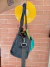 Bolsa Uncle K cinza e verde - comprar online