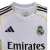 Camisa Real de Madrid I 25/26 - Torcedor Adidas Masculina - Branca com detalhes em cinza e amarelo - Vortex Mantos