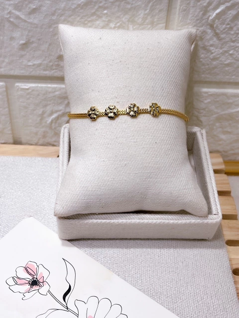 PULSEIRA FOLHEADA A OURO 18K - TREVO NA FITA