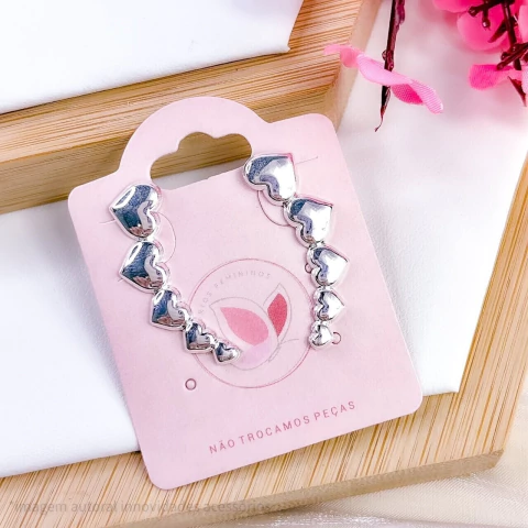BRINCO EAR CUFF FOLHEADO A PRATA CORAÇÕES