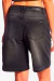 Bermuda de mujer Volcom Loose 22” en denim negro desgastado, vista trasera mostrando bolsillos y etiqueta Volcom Brand Jeans.