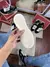 Solado leve e confortável do tênis Ultrarange branco