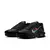 Detalhe lateral com múltiplos swooshes em cores vibrantes.