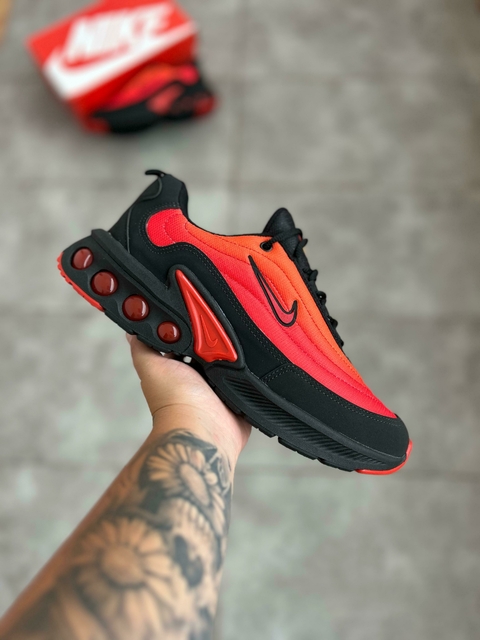 Estilo que impacta: Air Max DN Laranja Premium com tecnologia Air Max.