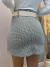 Short saia mini fendas cinto off white fivela xadrez pied de poule tricolor preto & nude & branco na internet