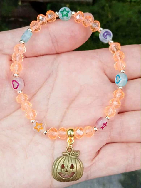 Pulsera de Calabaza Café con lunetas fosforescentes