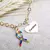 Pulseira Personalizada Com Pingente Laço Autismo E Pingente Coração Com Nome Em Banho de Ouro 18k - comprar online