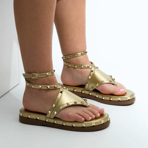 Rasteira Dalila Dourada Taxas - comprar online