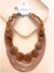 Colar Duplo Fios e Círculos Marrons - comprar online