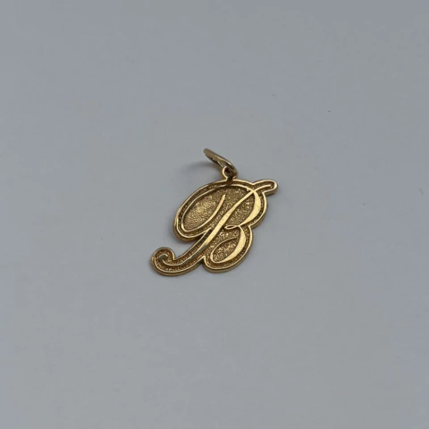 Dije Inicial Relieve - comprar en línea