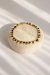 Pulseira Moedinhas Black Dourado