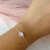 PULSEIRA GOTA CRAVEJADA - LOJA BRILHO DE PRATA