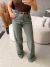 Calça jeans wide leg sujinha