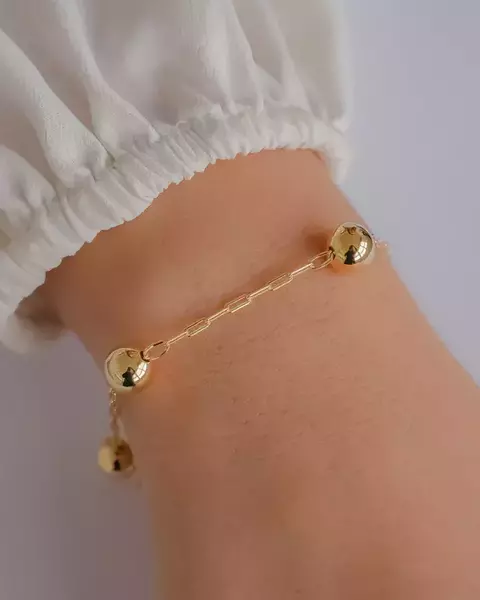 Pulseira com Bolas Lisas na Corrente Cartier no Dourado