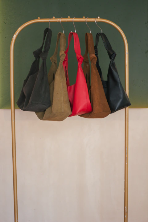 Knotted suede bag