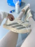 ADIZERO EVO SL OFF PRATA - loja online