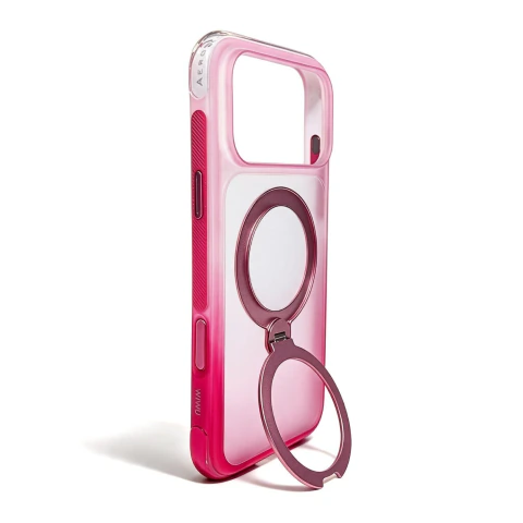 Case AeroShield Aurora Rosa em pe, apoiada no anel giratorio