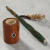 Cachimbo Xamânico Desmontável — Verde e Marrom com Penas - comprar online