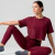 Camiseta Feminina Dry Fit - Logo Dourado Oversized - Burgundy - comprar online