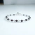 Pulsera tejida con granate