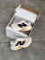 Tênis New Balance Fuelcell Rebel V4 - BRANCO/SUNSET - FitHive