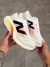 Tênis New Balance Fuelcell Rebel V4 - BRANCO/SUNSET - comprar online