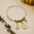 Pulseira Nossa Senhora Aparecida Espírito Santo Metal Dourado - Artigos Religiosos Católicos | Loja Católica | Presentes e Lembranças