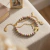 Pulseira Nossa Senhora de La Salette Dourada na internet