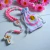 Terço Rosário Infantil Anjo da Guarda Menina Saquinho Rosa - Artigos Religiosos Católicos | Loja Católica | Presentes e Lembranças