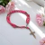 Pulseira Terço Acampamento Madeira Rosa 4 mm - Artigos Religiosos Católicos | Loja Católica | Presentes e Lembranças