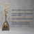 Chaveiro Capelinha Sagrada Família Metal Dourado - comprar online